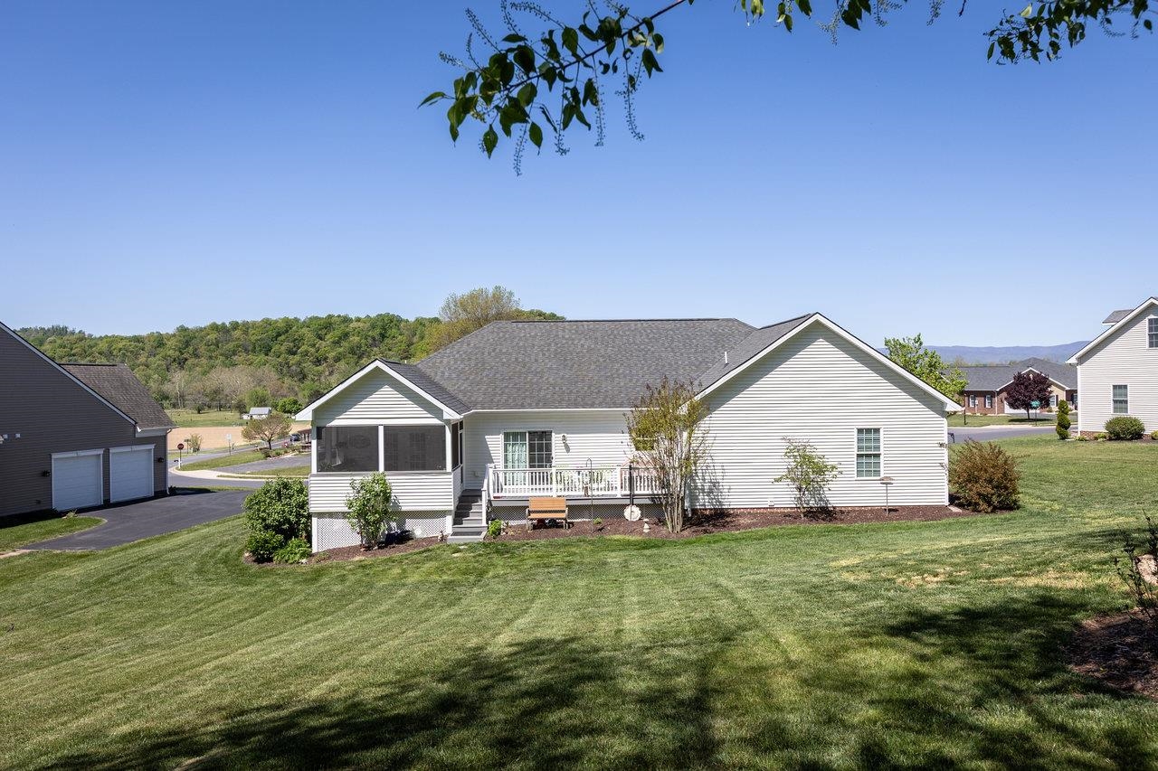 102 Millview Drive Bridgewater, VA 22812 - Photo 48 of 59 a view of a house with a big yard potted plants and large tree