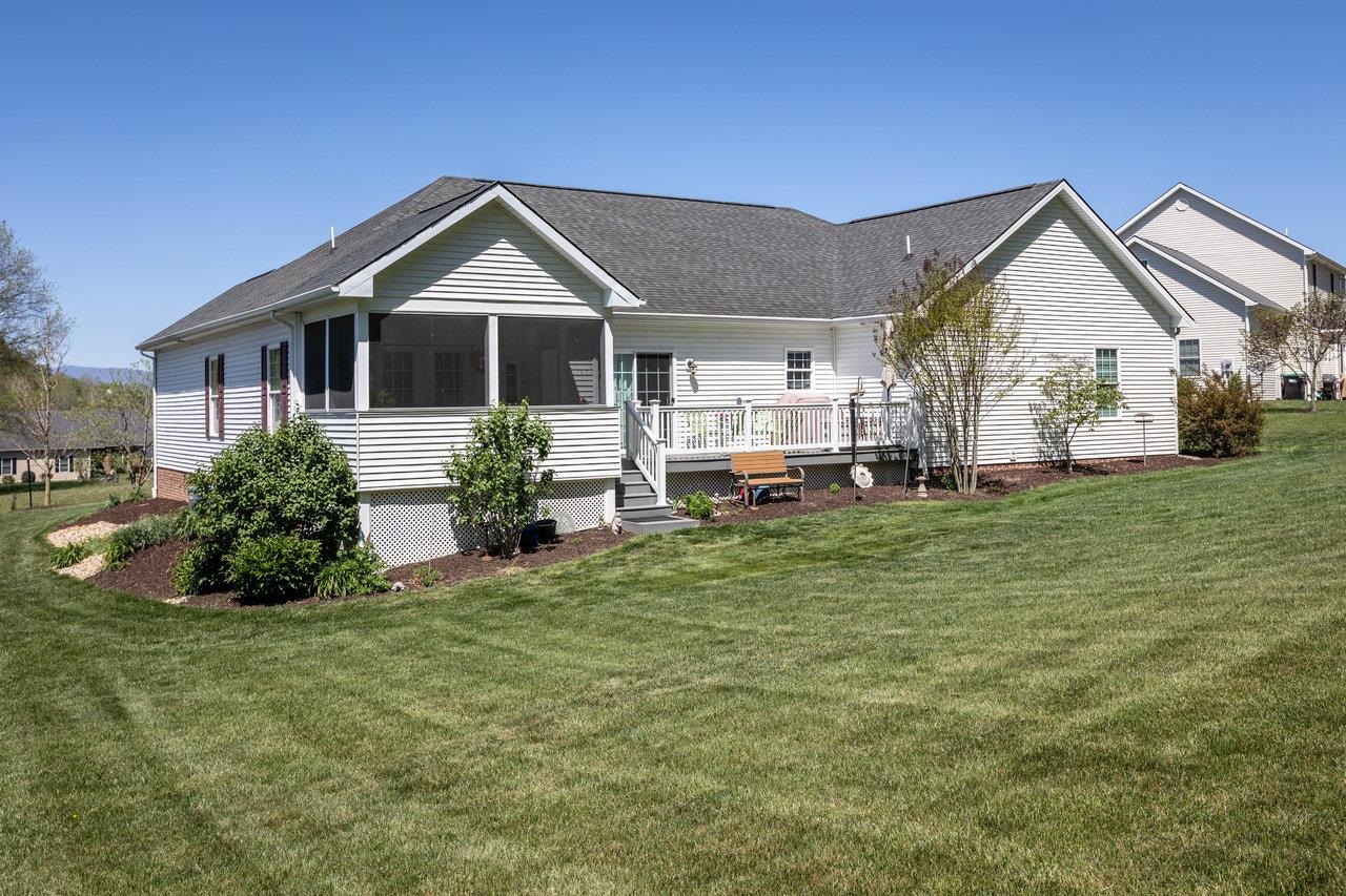 102 Millview Drive Bridgewater, VA 22812 - Photo 54 of 59 a front view of a house with a yard and garage