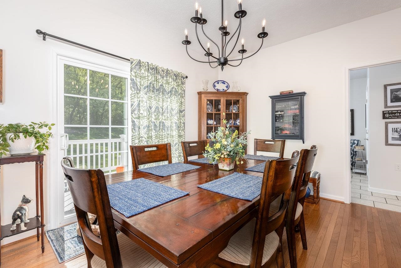 102 Millview Drive Bridgewater, VA 22812 - Photo 9 of 59 a view of a dining room with furniture window and wooden floor