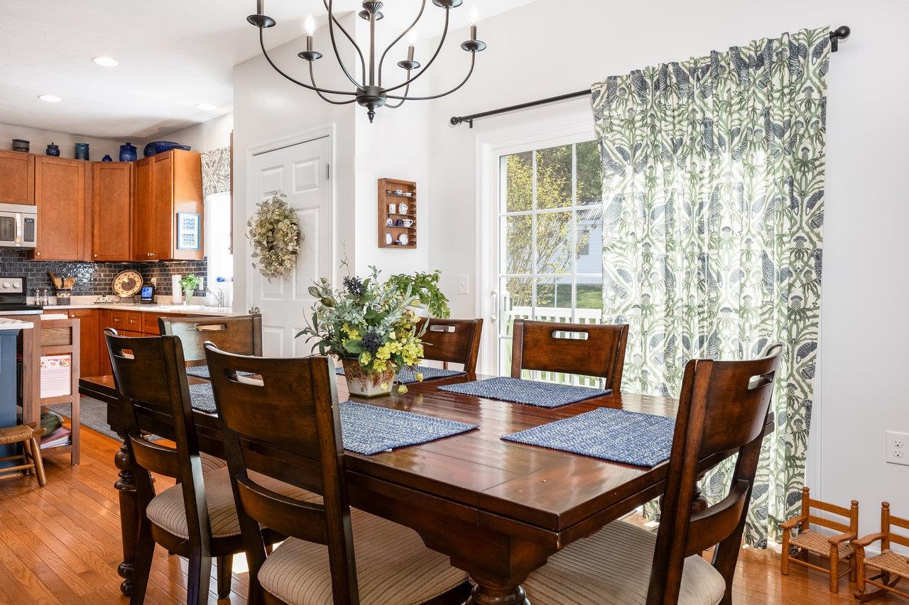 102 Millview Drive Bridgewater, VA 22812 - Photo 10 of 59 a view of a dining room with furniture window and wooden floor