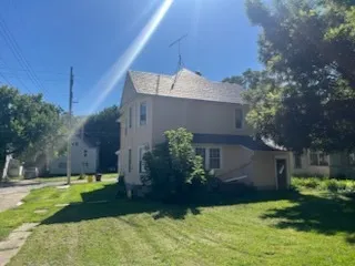a house view with a garden space