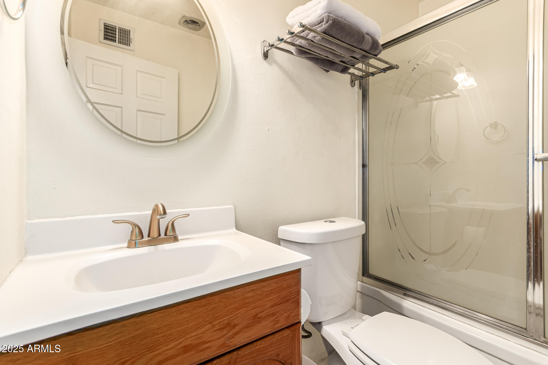 710 East Atlanta Avenue Phoenix, AZ 85040 - Photo 16 of 21 a bathroom with a sink a toilet and shower