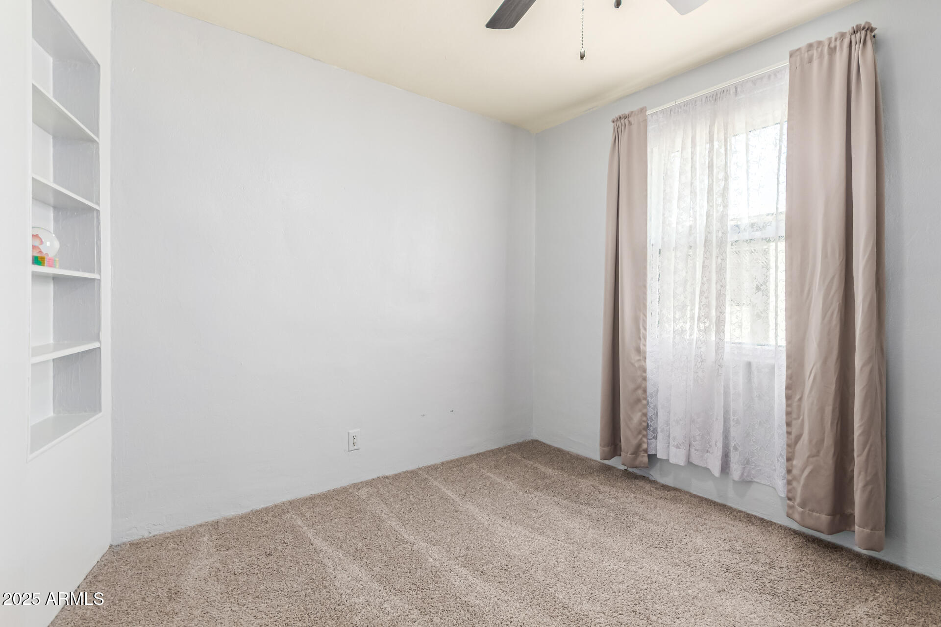 710 East Atlanta Avenue Phoenix, AZ 85040 - Photo 17 of 21 a view of an empty room with a window