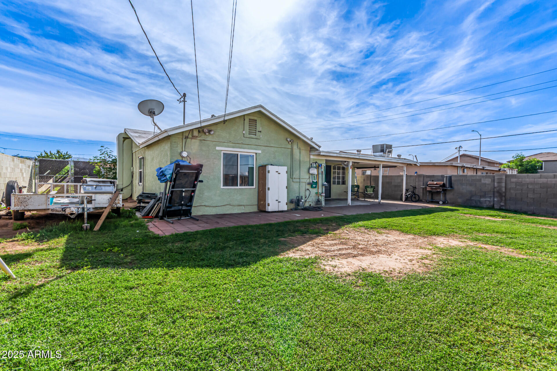 710 East Atlanta Avenue Phoenix, AZ 85040 - Photo 19 of 21 a front view of a house with a yard