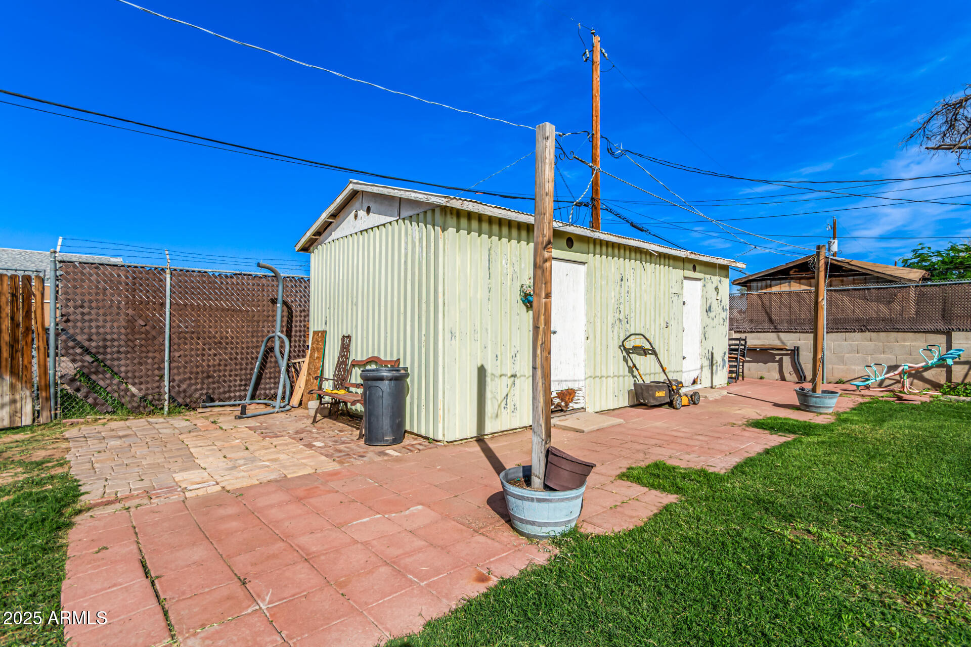 710 East Atlanta Avenue Phoenix, AZ 85040 - Photo 20 of 21 a view of a house with backyard and sitting area