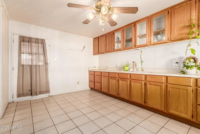a room with cabinets and window