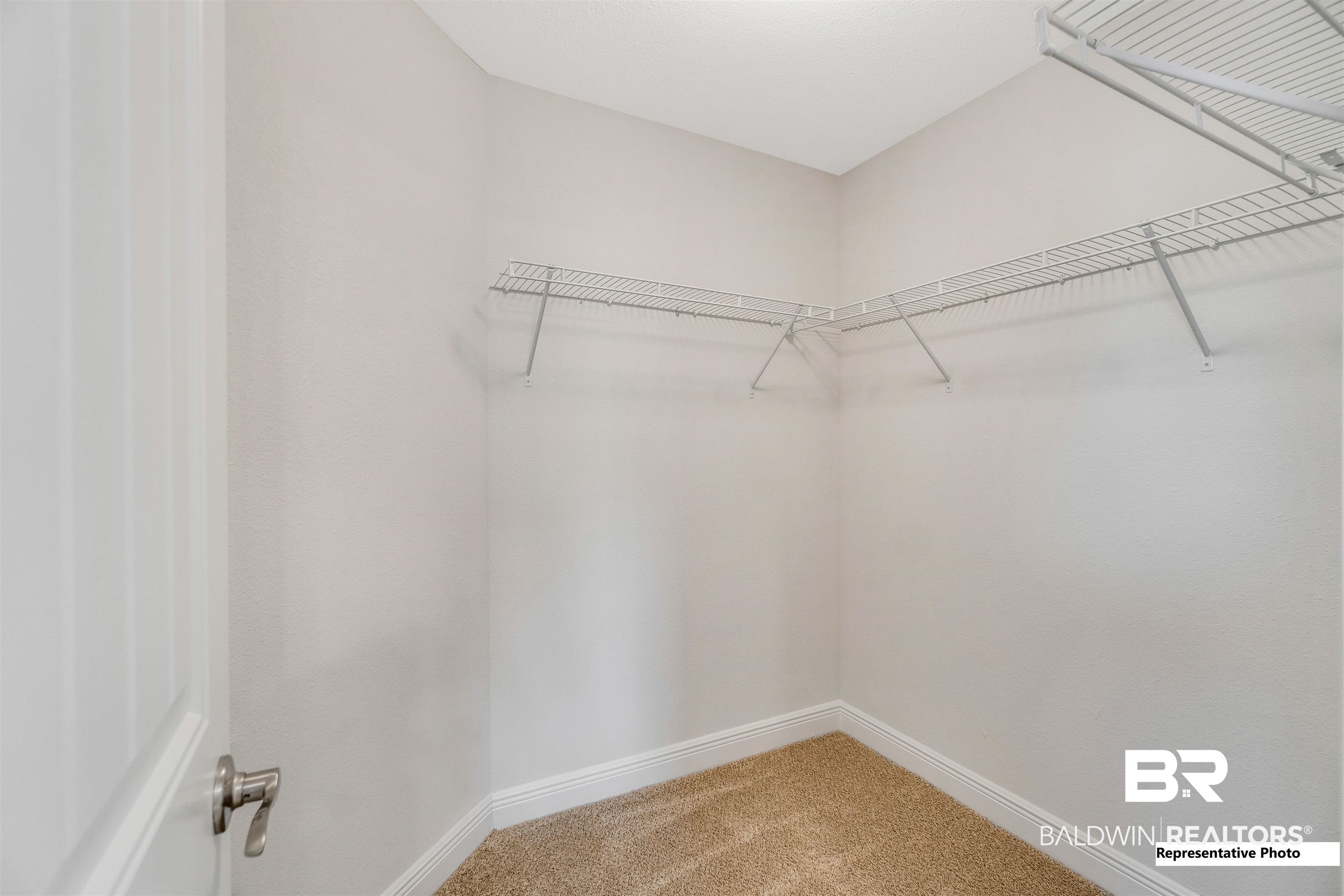 643 Mayflower Drive Foley, AL 36535 - Photo 31 of 34 Spacious closet with light colored carpet