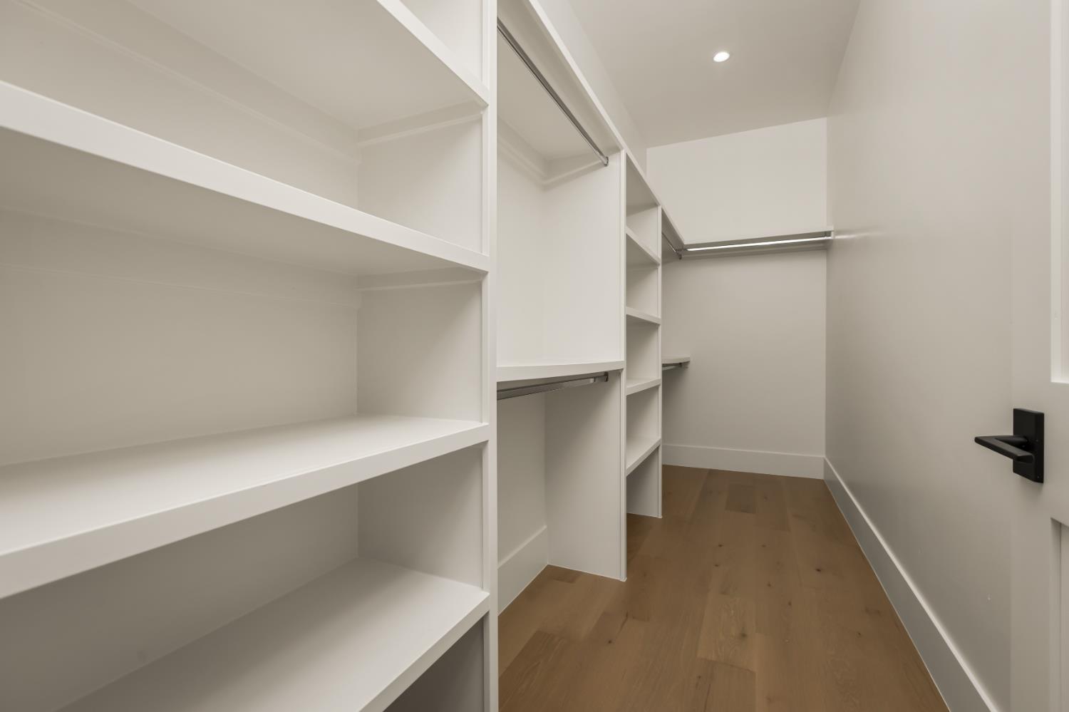 1632 The Point Meadow Vista, CA 95722 - Photo 48 of 60 a view of walk in closet with empty racks