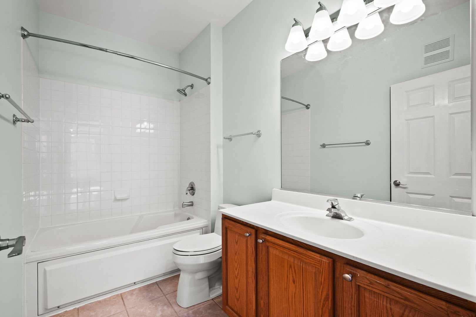 2568 Golf Ridge Circle, Unit 2568 Naperville, IL 60563 - Photo 12 of 18 a bathroom with a sink a toilet and shower