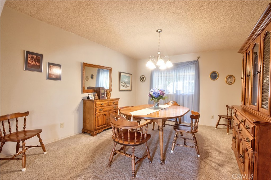 335 Zada Lane Vista, CA 92084 - Photo 16 of 44 a view of a dining room with furniture and window