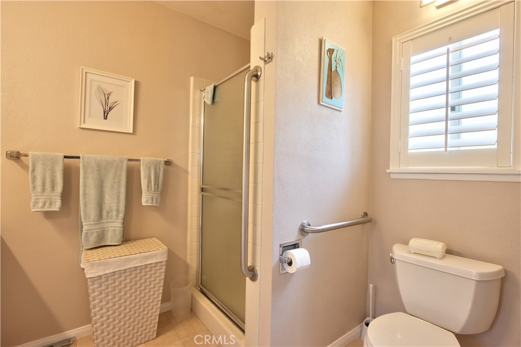 335 Zada Lane Vista, CA 92084 - Photo 29 of 44 a bathroom with a toilet and a shower