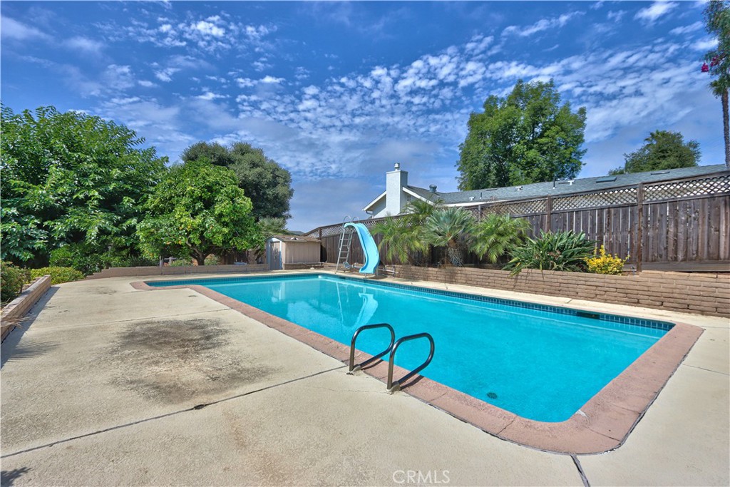 335 Zada Lane Vista, CA 92084 - Photo 31 of 44 a view of a swimming pool with a patio