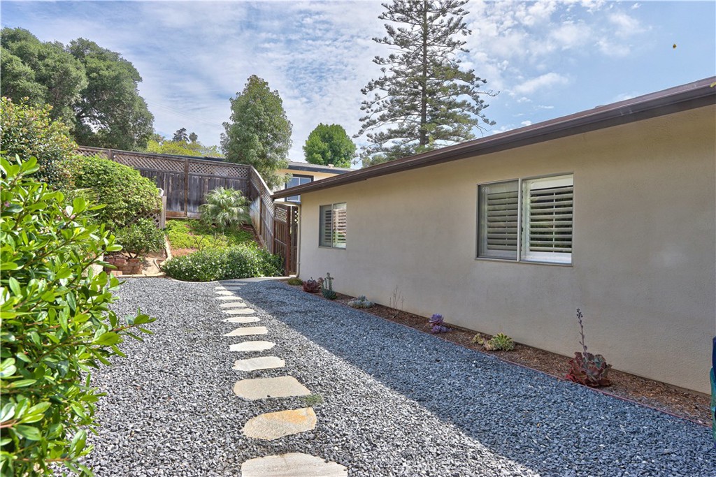 335 Zada Lane Vista, CA 92084 - Photo 33 of 44 a house with trees in the background