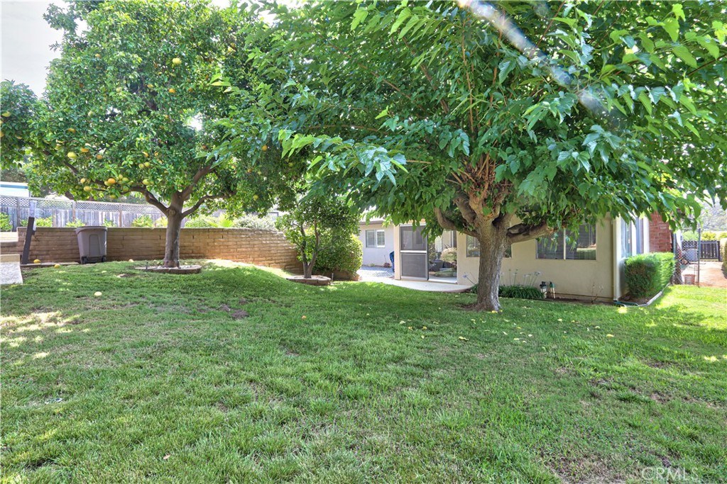 335 Zada Lane Vista, CA 92084 - Photo 35 of 44 a house view with a garden