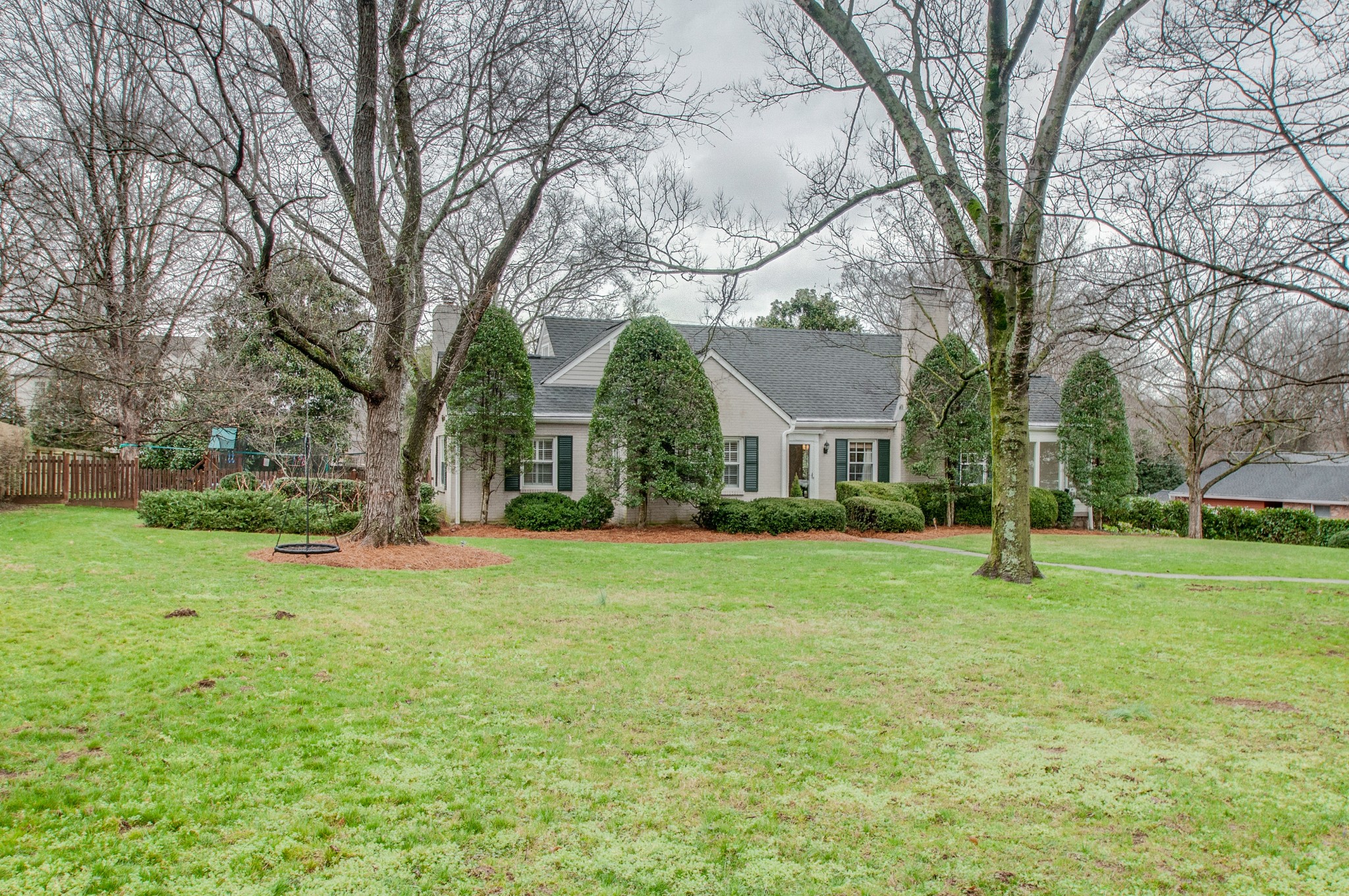 144 Cheek Road Nashville, TN 37205 - Photo 1 of 15 a front view of house with yard and green space