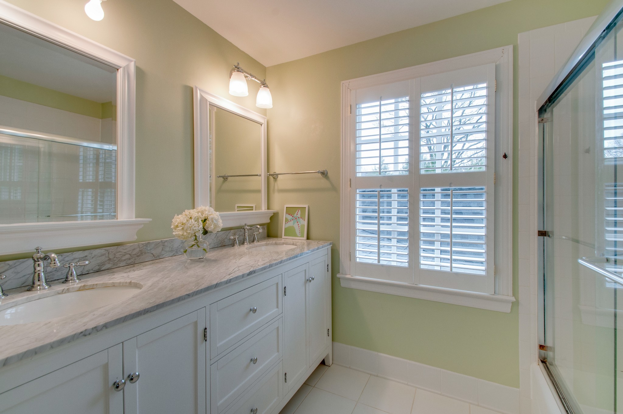 144 Cheek Road Nashville, TN 37205 - Photo 11 of 15 a bathroom with double vanity and a mirror