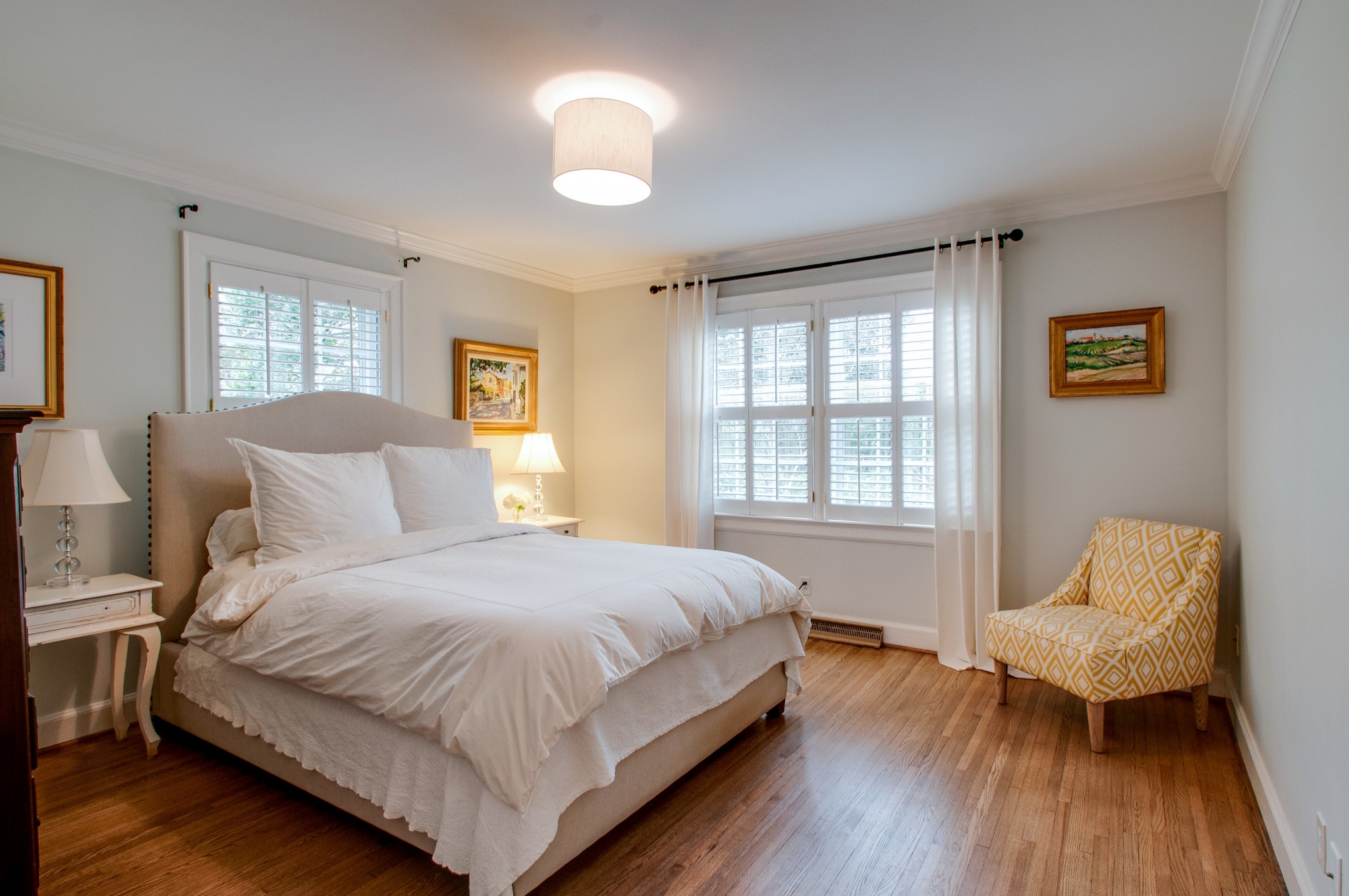 144 Cheek Road Nashville, TN 37205 - Photo 3 of 15 a bedroom with a bed and a chair