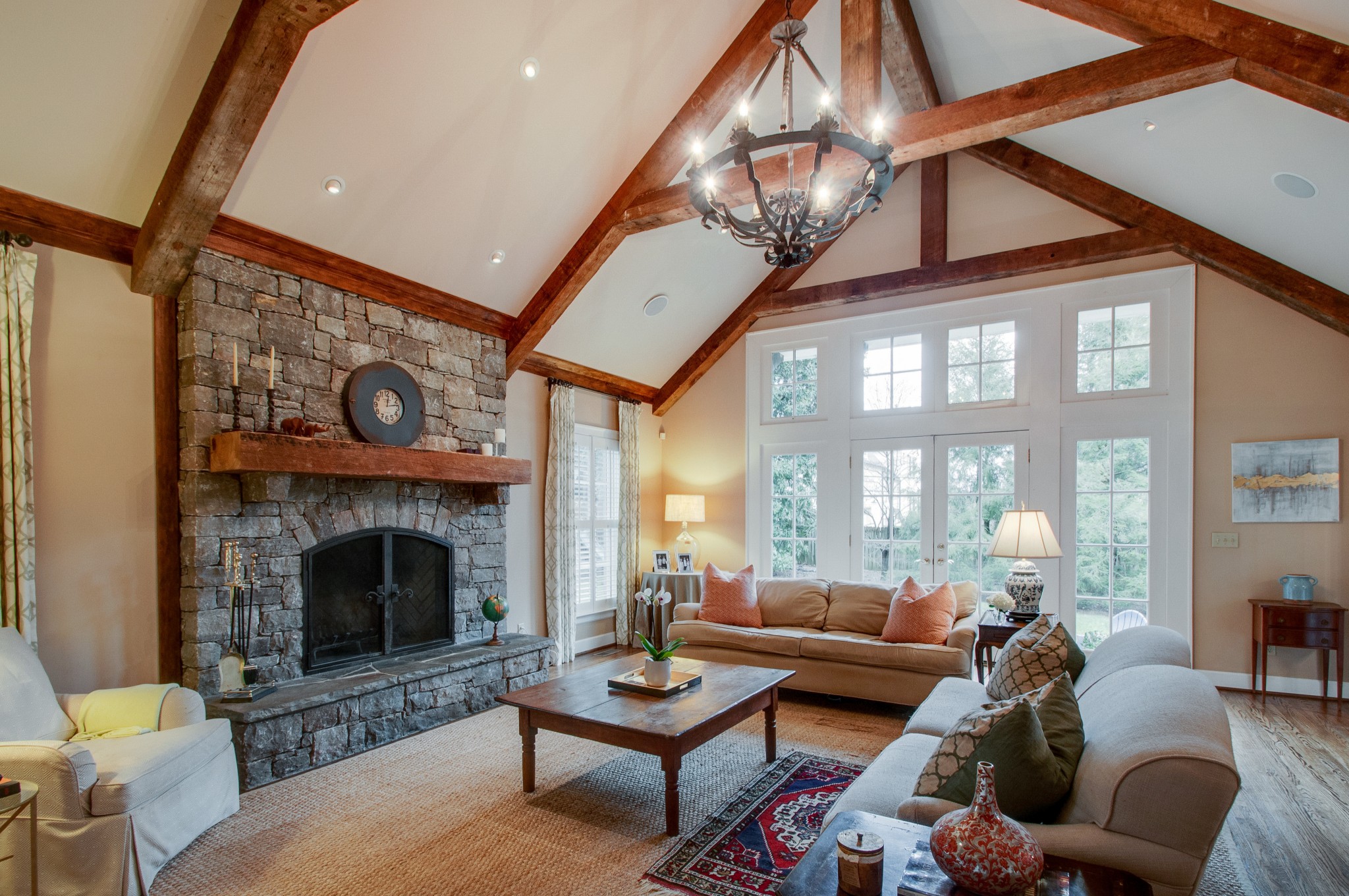 144 Cheek Road Nashville, TN 37205 - Photo 7 of 15 a living room with furniture a fireplace a lamp and a large window