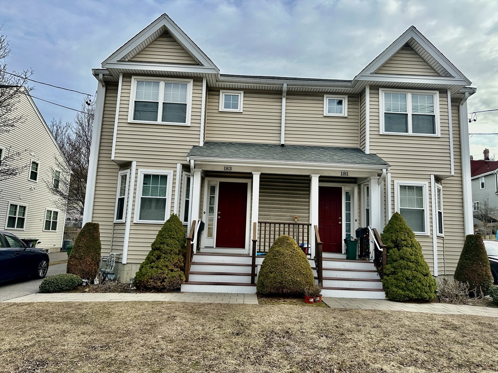 183 Summer Street, Unit 183 Watertown, MA 02472 - Photo 12 of 12 a front view of a house with a yard