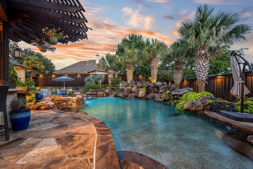 a wooden bench sitting in middle of a lake