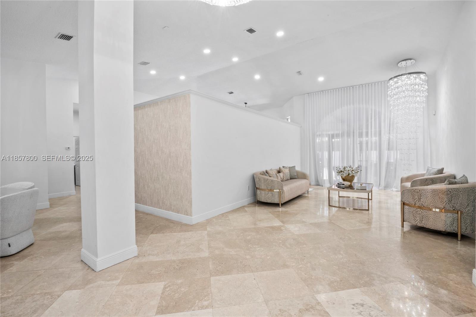 5750 Southwest 67th Avenue Miami, FL 33143 - Photo 13 of 62 a view of an empty room and a window