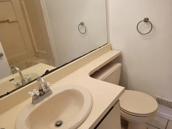 a bathroom with a sink and a toilet