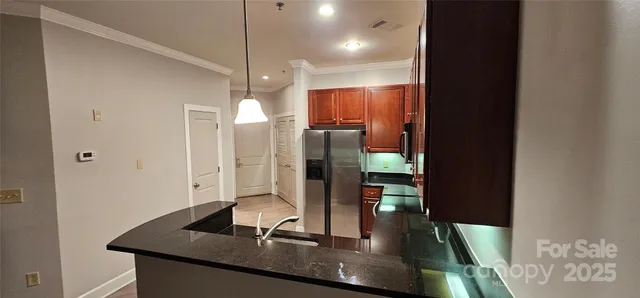 a view of a living room with a sink