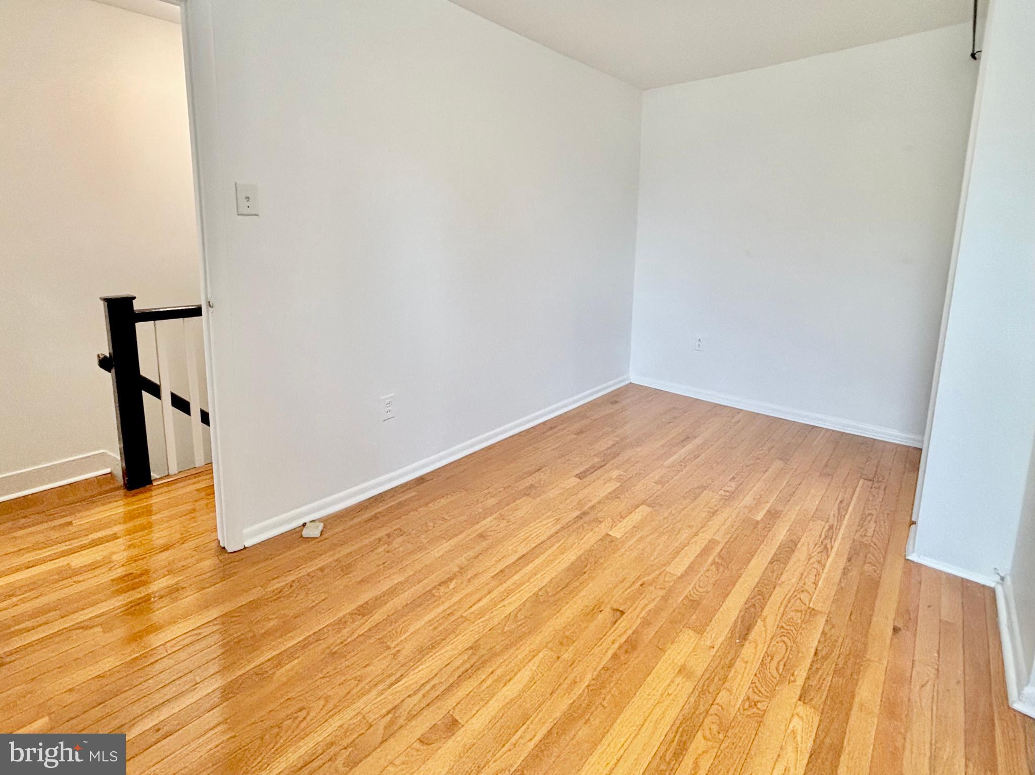 766 Martin Street Philadelphia, PA 19146 - Photo 24 of 35 a view of empty room with wooden floor and fan