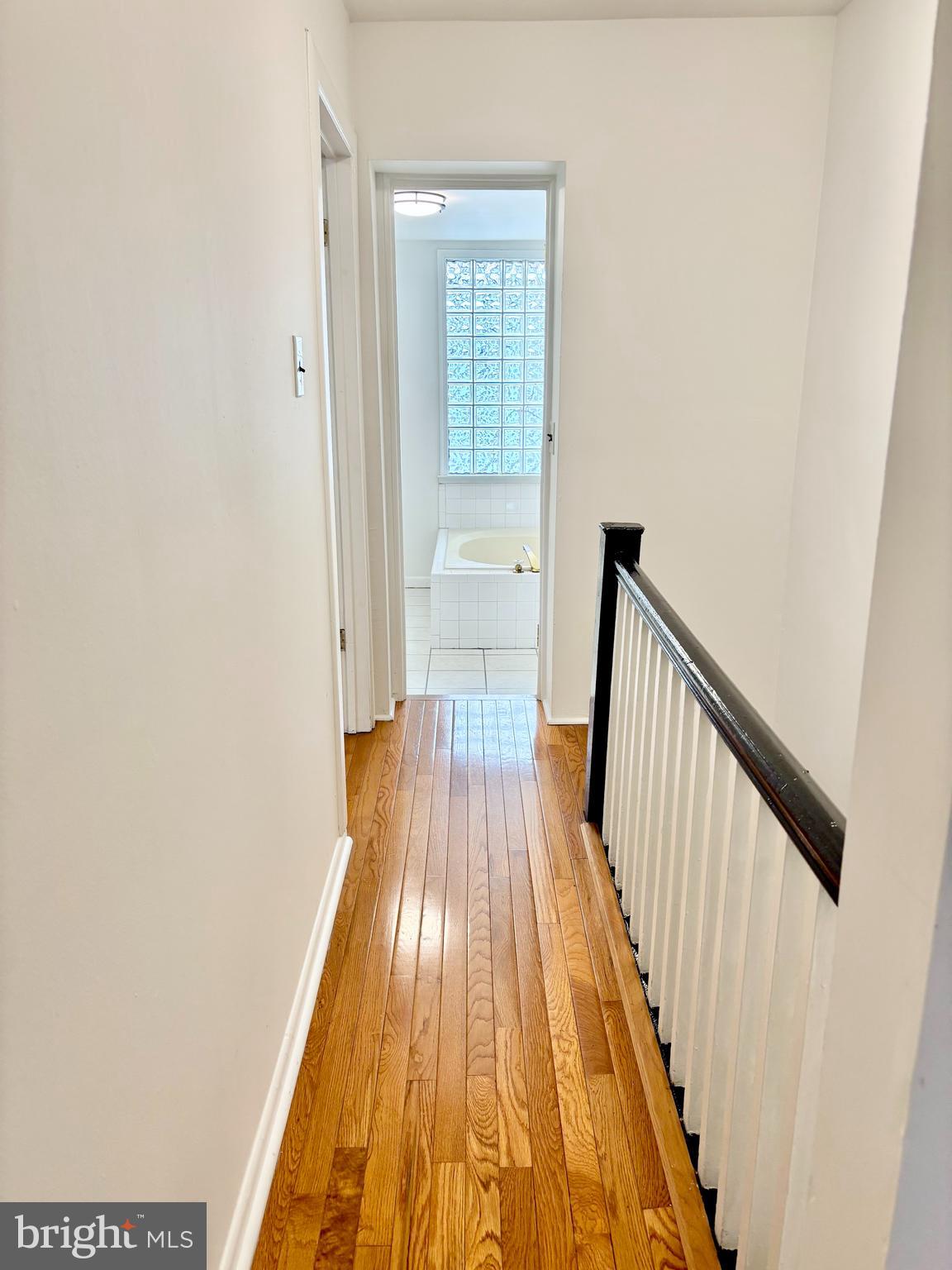 766 Martin Street Philadelphia, PA 19146 - Photo 25 of 35 a view of a hallway with wooden floor