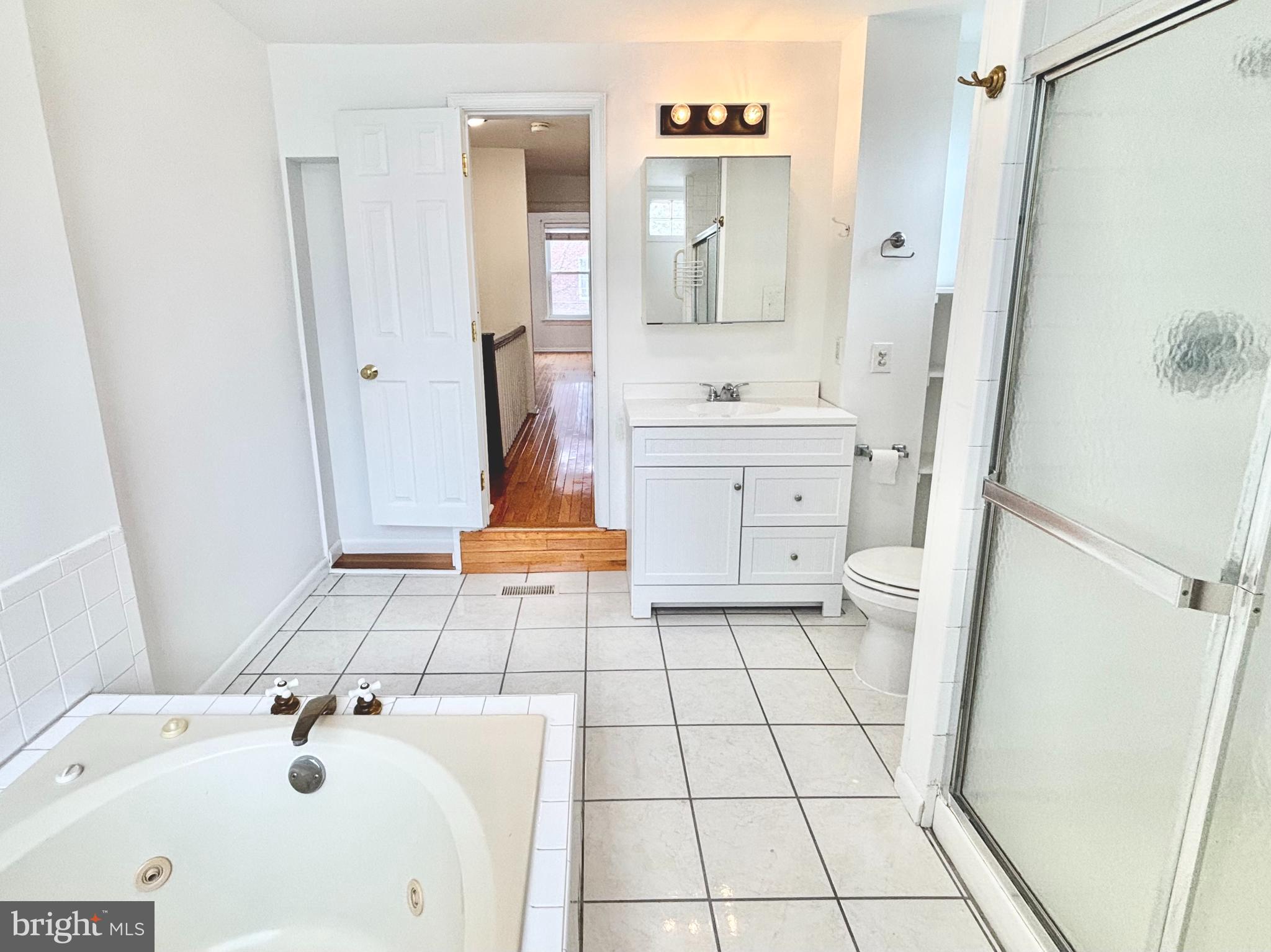766 Martin Street Philadelphia, PA 19146 - Photo 27 of 35 a bathroom with a sink toilet and shower