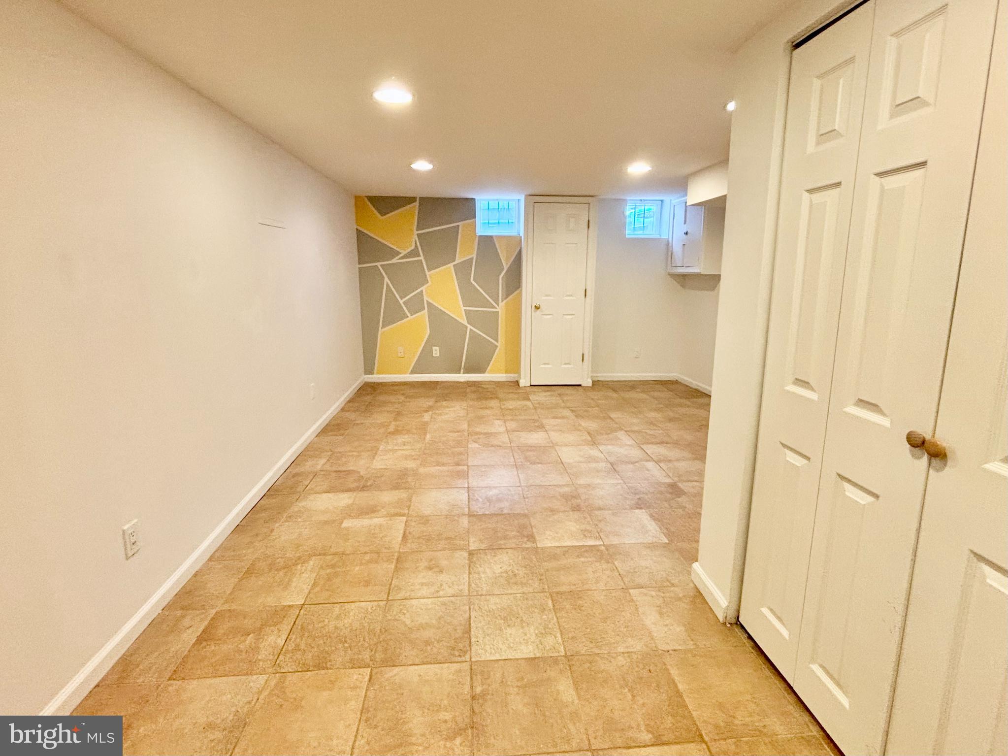 766 Martin Street Philadelphia, PA 19146 - Photo 29 of 35 a view of hallway with a rug and a shower