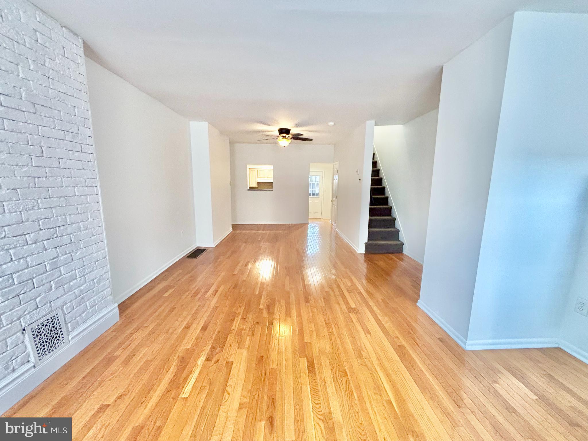 766 Martin Street Philadelphia, PA 19146 - Photo 3 of 35 a view of a hallway with wooden floor