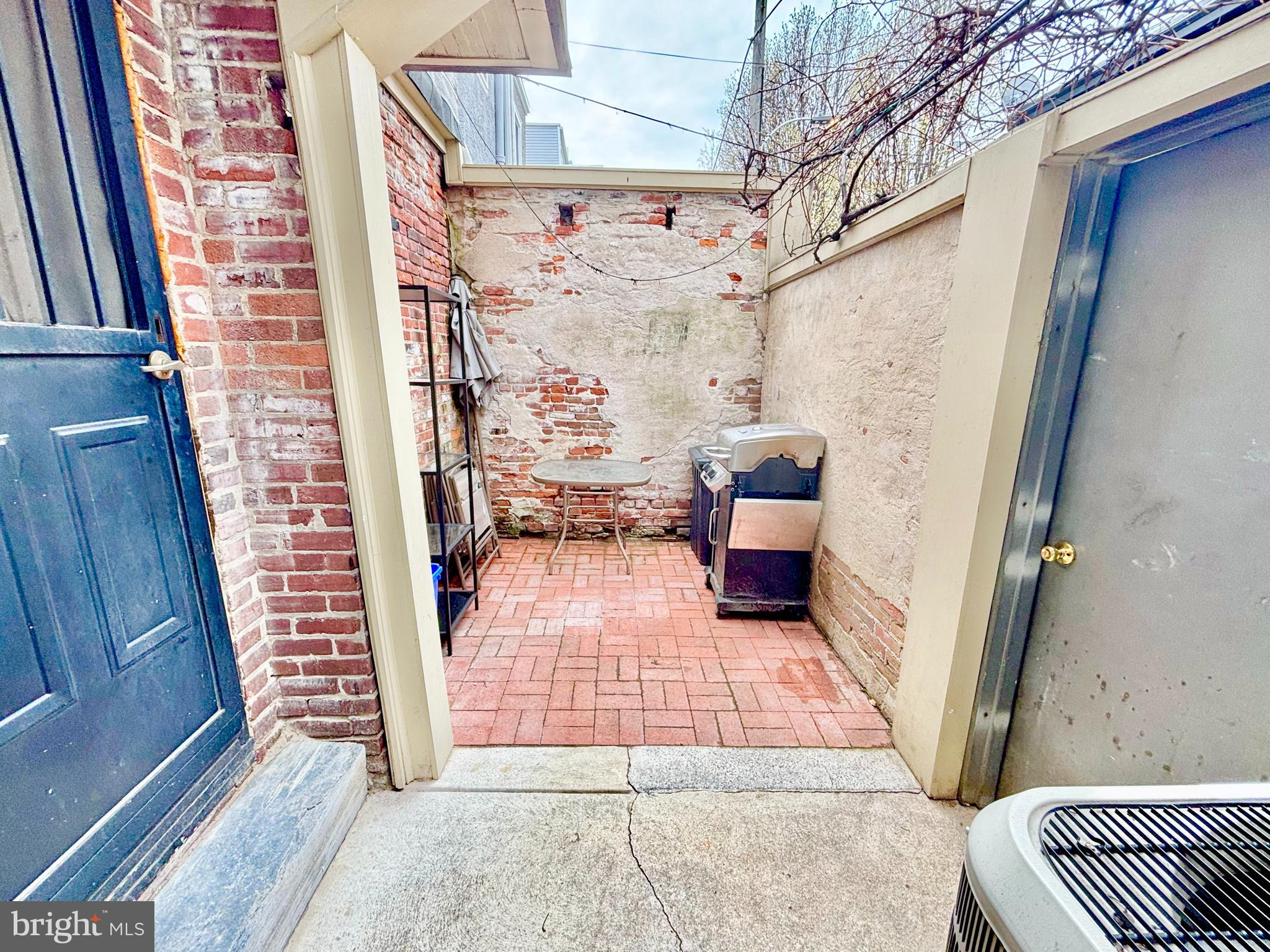 766 Martin Street Philadelphia, PA 19146 - Photo 32 of 35 a view of a porch with a door and a chair