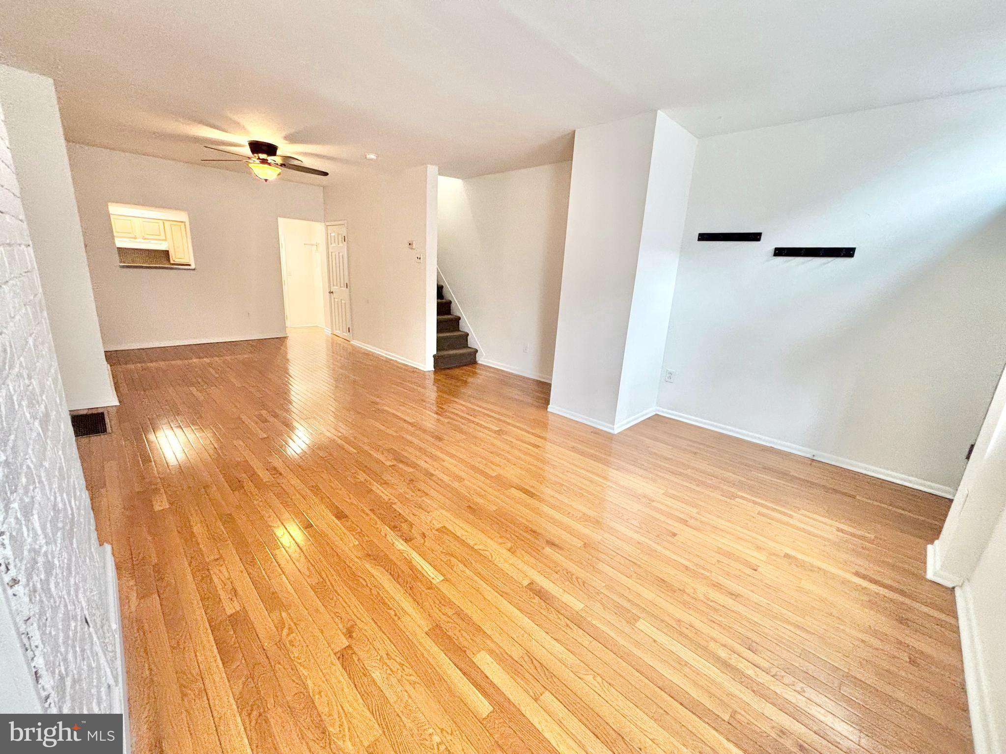 766 Martin Street Philadelphia, PA 19146 - Photo 4 of 35 a view of a livingroom with wooden floor