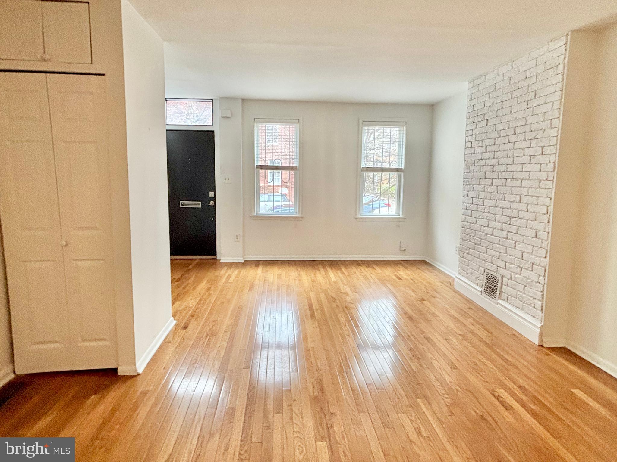 766 Martin Street Philadelphia, PA 19146 - Photo 8 of 35 a view of empty room with wooden floor and fan