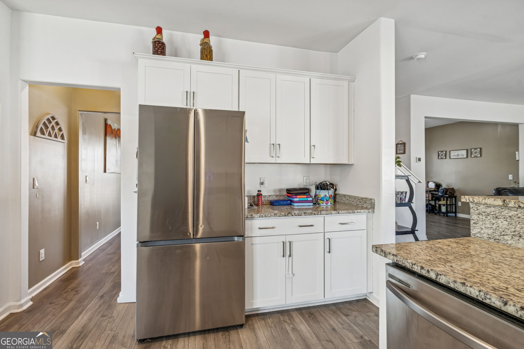103 Olson Way Kingsland, GA 31548 - Photo 20 of 54 a kitchen with a refrigerator sink and cabinets