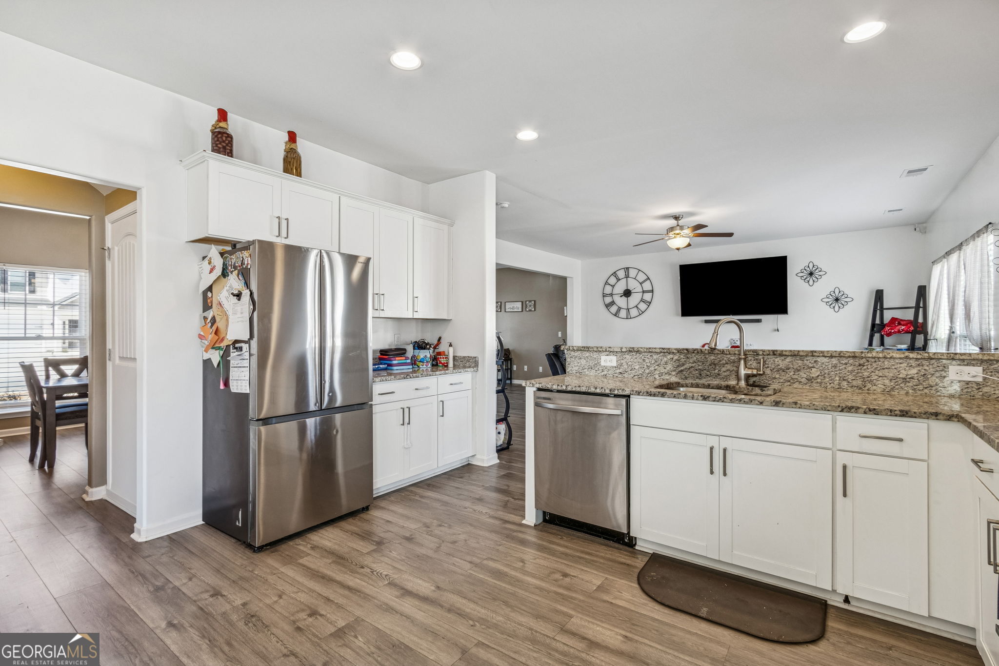 103 Olson Way Kingsland, GA 31548 - Photo 21 of 54 a kitchen with stainless steel appliances a refrigerator stove and sink