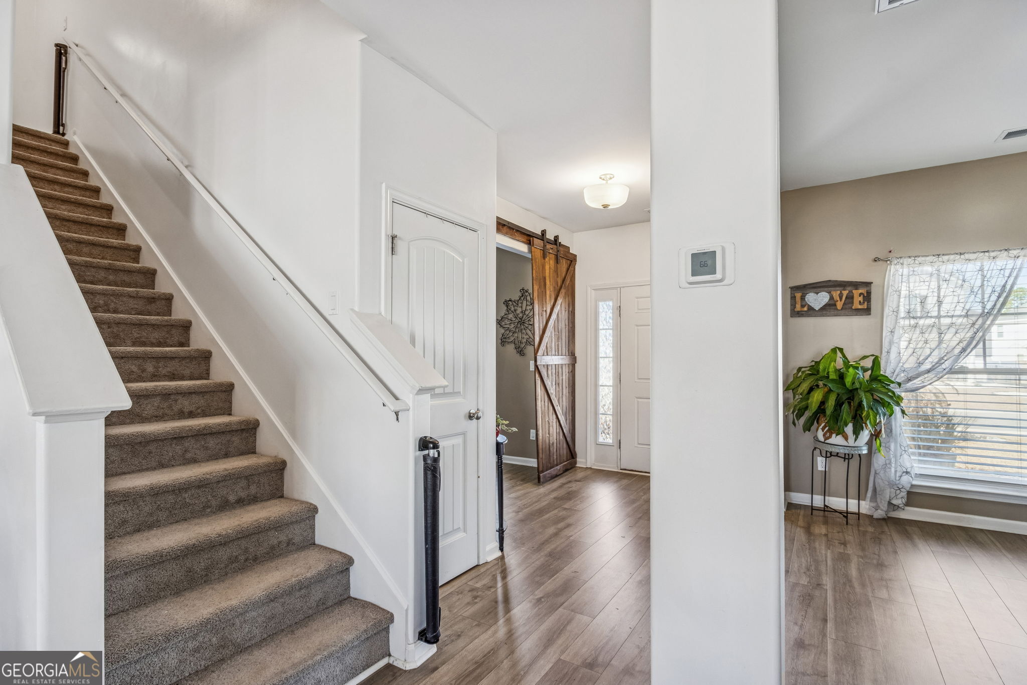 103 Olson Way Kingsland, GA 31548 - Photo 25 of 54 a view of entryway with wooden floor and stairs