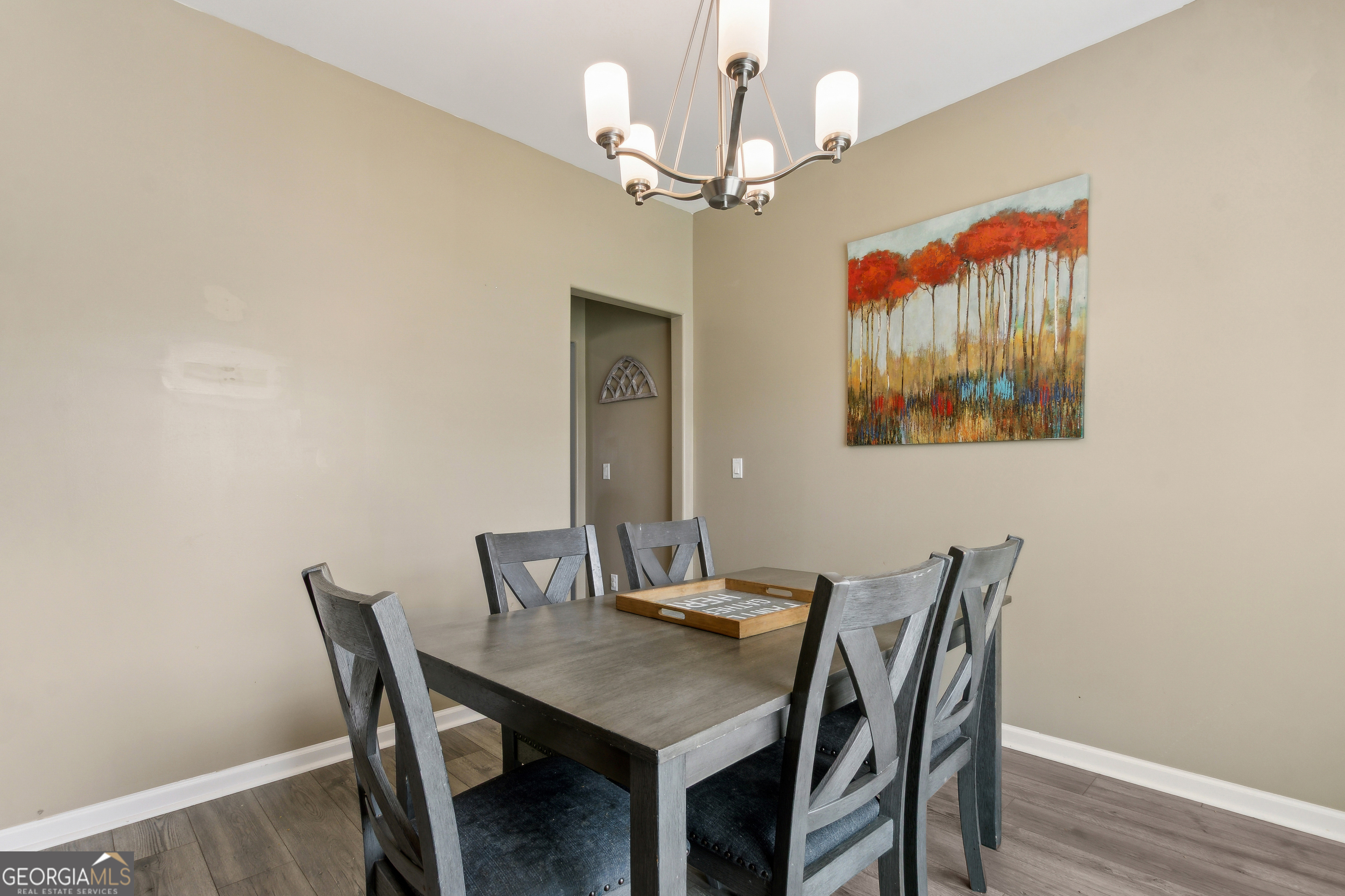 103 Olson Way Kingsland, GA 31548 - Photo 28 of 54 a view of a dining room with furniture and wooden floor
