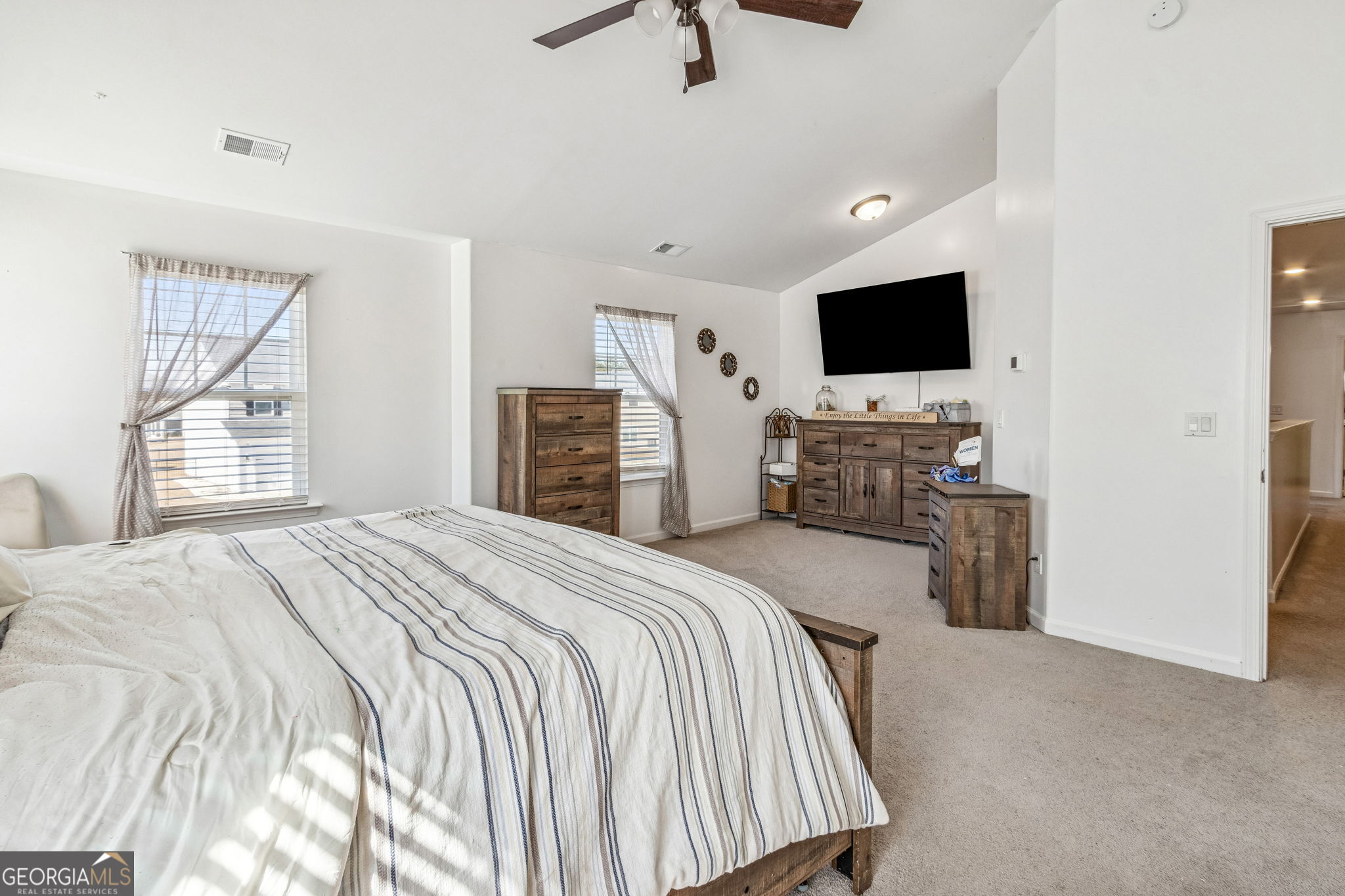 103 Olson Way Kingsland, GA 31548 - Photo 33 of 54 a bedroom with a bed and a flat screen tv