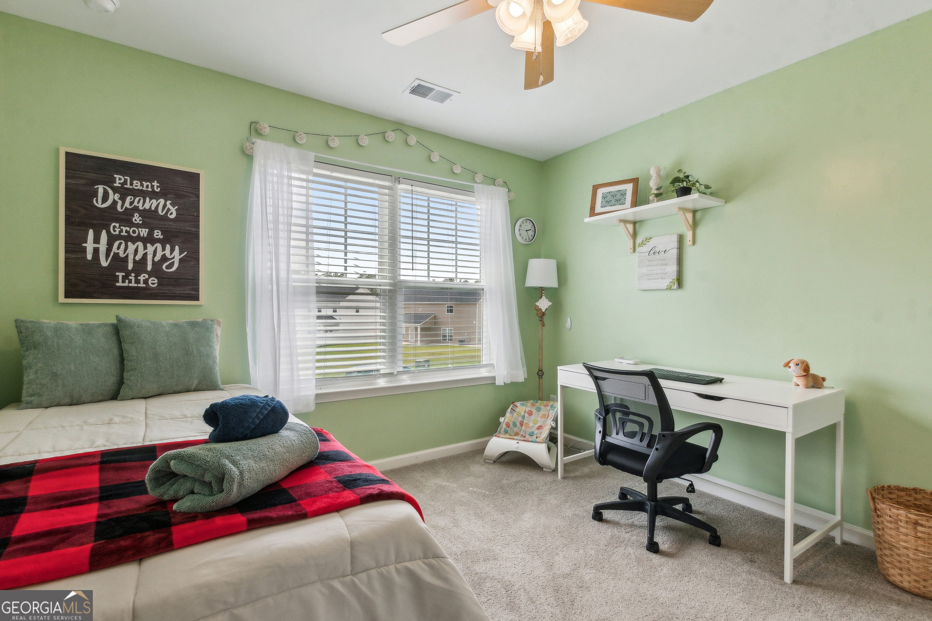 103 Olson Way Kingsland, GA 31548 - Photo 41 of 54 a bedroom with a bed and a window