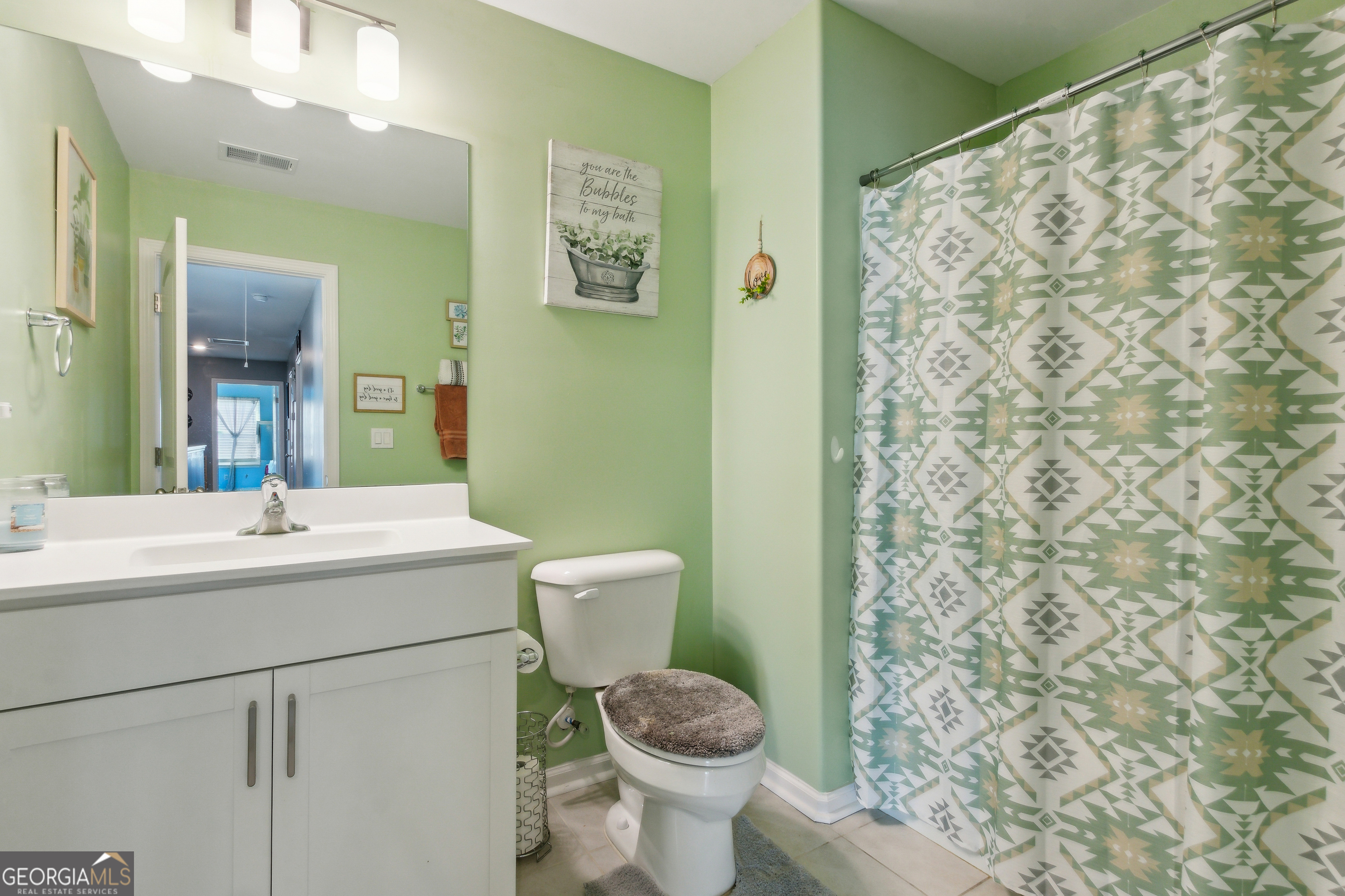 103 Olson Way Kingsland, GA 31548 - Photo 43 of 54 a bathroom with a sink and a toilet