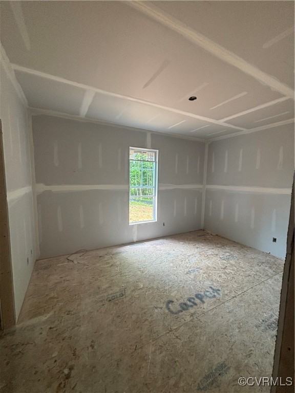 80 Maple Tree Lane Spring Grove, VA 23881 - Photo 14 of 14 an empty room with a empty space and windows