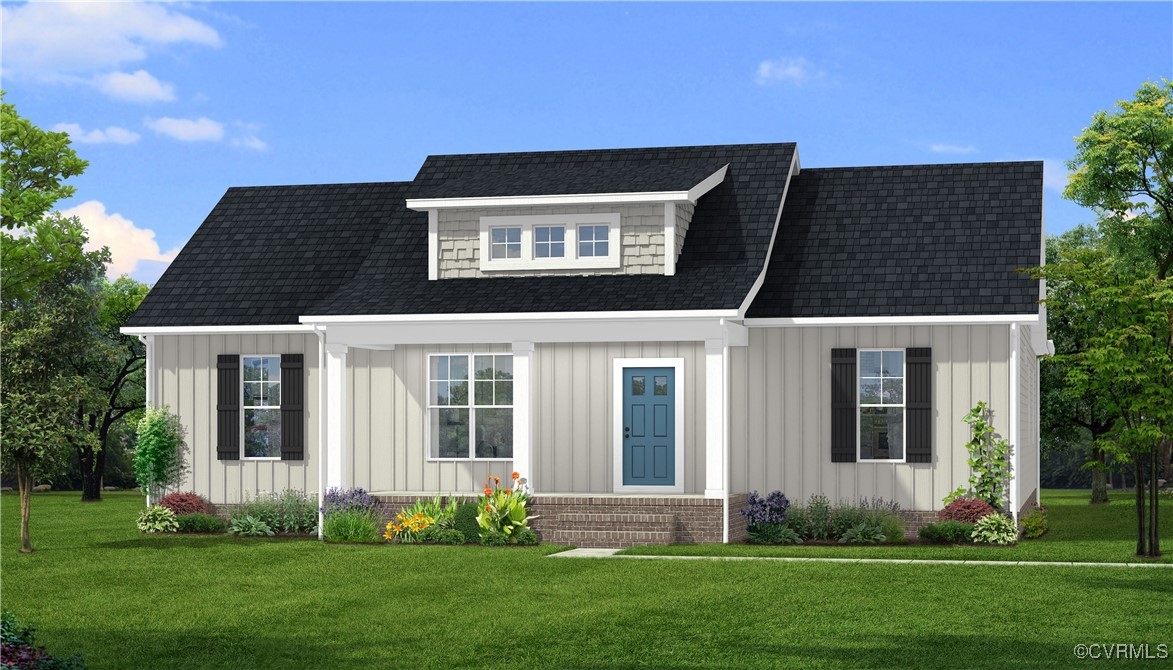 80 Maple Tree Lane Spring Grove, VA 23881 - Photo 4 of 14 a front view of a house with a yard