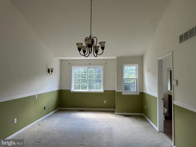 a view of a room with a window