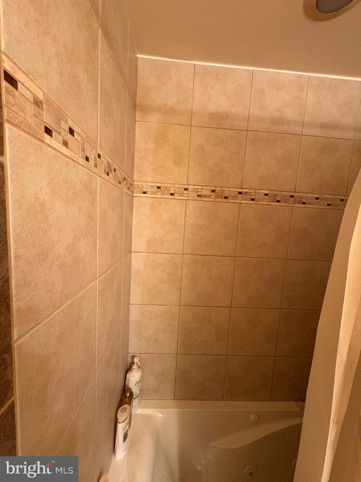 2713 Hampden Avenue Baltimore, MD 21211 - Photo 20 of 23 a bathroom with a shower