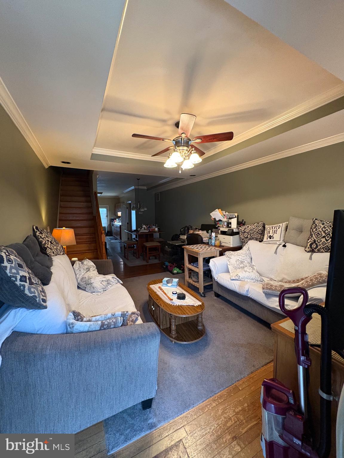 2713 Hampden Avenue Baltimore, MD 21211 - Photo 4 of 23 a living room with furniture and a chandelier