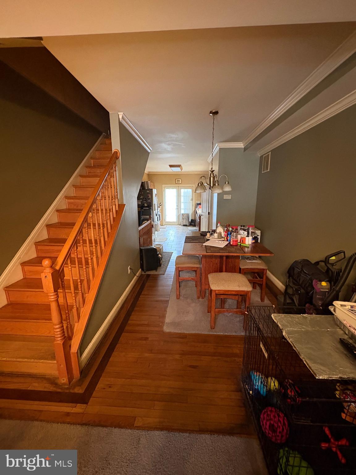 2713 Hampden Avenue Baltimore, MD 21211 - Photo 6 of 23 a living room with furniture and a wooden floor
