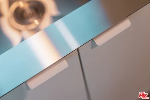 a view of bedroom with wooden floor and bathroom