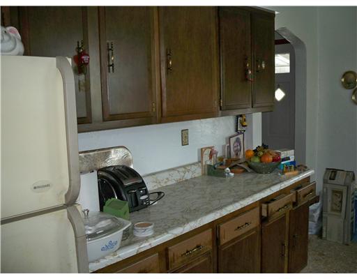 Dining Room. The kitchen has the diningroom/breakfast nook area that also has more cabinet space.